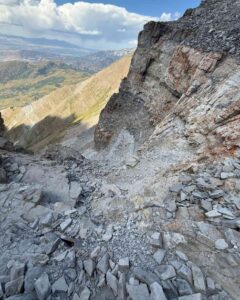 Rocky summit view from Mount Timpanogos overlooking Utah Valley.